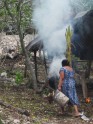 Woman Burning Sugar Cane