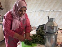 Souad showing how she prepares herb tea