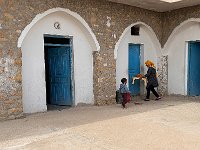 this sub-ground dwelling has been partially converted into a guest house/hotel run by the family .