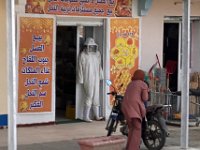 Driving through the modern university city of Gafsa - I was interested to see this young hijab'd woman place her son on the bike before getting on it herself.  sorry for no more shots.