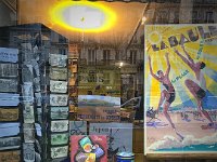 Exploring the hood.  A poster shop window