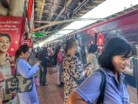 Learning how to use the busy  Sky Train - Bangkok is huge and polluted.  This is in the air. (If only I could read the signs...