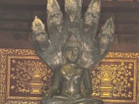 Saturday's Buddha is protected by the 5-headed snake who also serves as his seat.