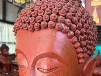 And a new day - we visit a Buddha factory - learn about and see molds, paint, materials, lotsa motor scooters, etc.