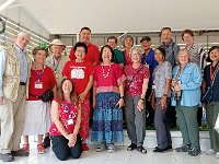 They thenn insisted on group photos - so here is our whole group + Kathy on the right, our wonderful Trip Leader and three family members in the middle.  Merry Xmas!