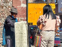 Watching the vendors at the San Francisco church