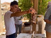 First stop: a mountain village where we are shown how the lamb is cooked and prepped for their schwarma-like dish.